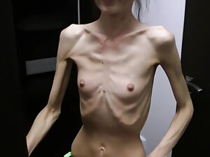 Half-starved Denisa posing store up up has ribs stricken